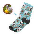 Load image into Gallery viewer, blue Mistletoe socks personalized with photo of face printed on them
