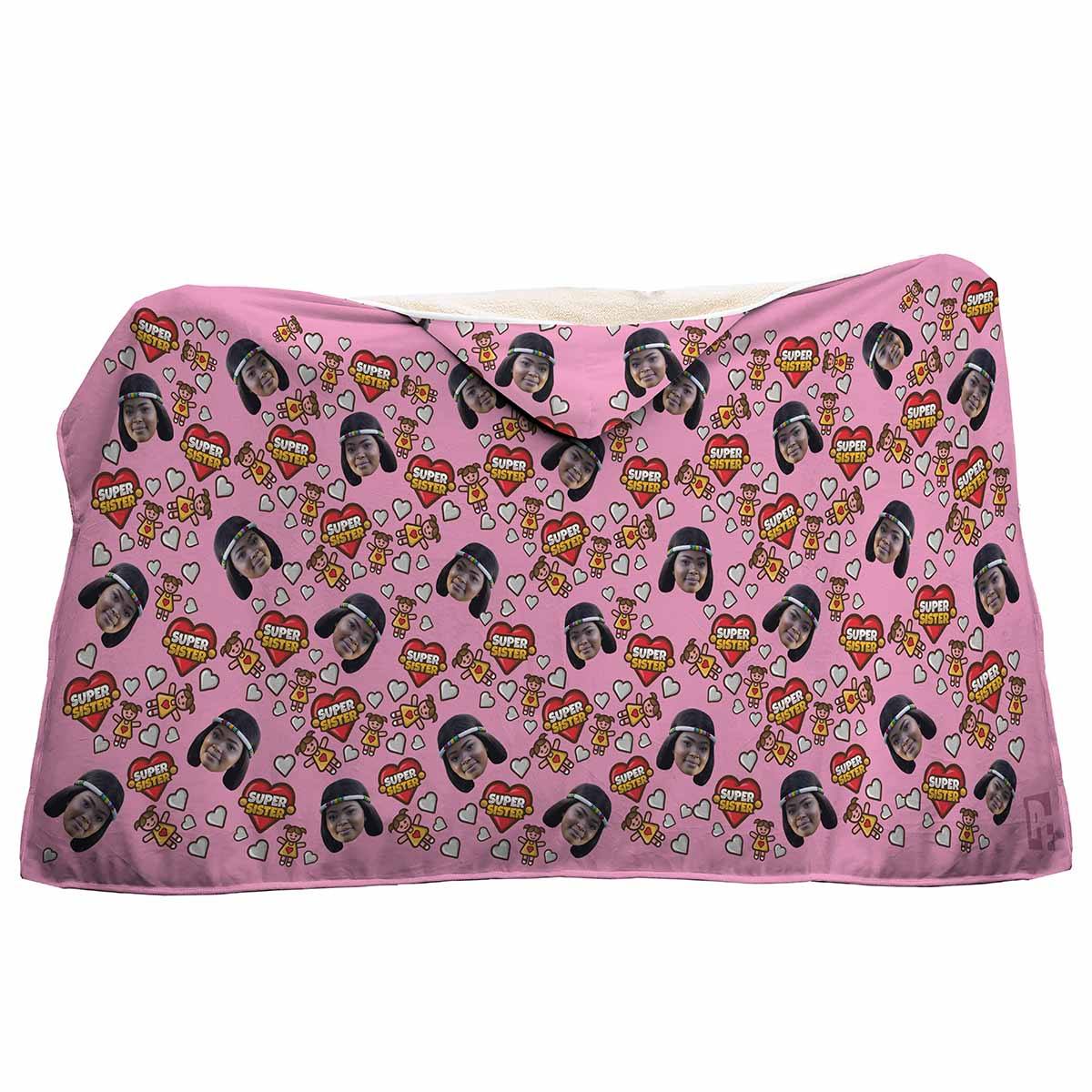 pink Super Sister hooded blanket personalized with photo of face printed on it
