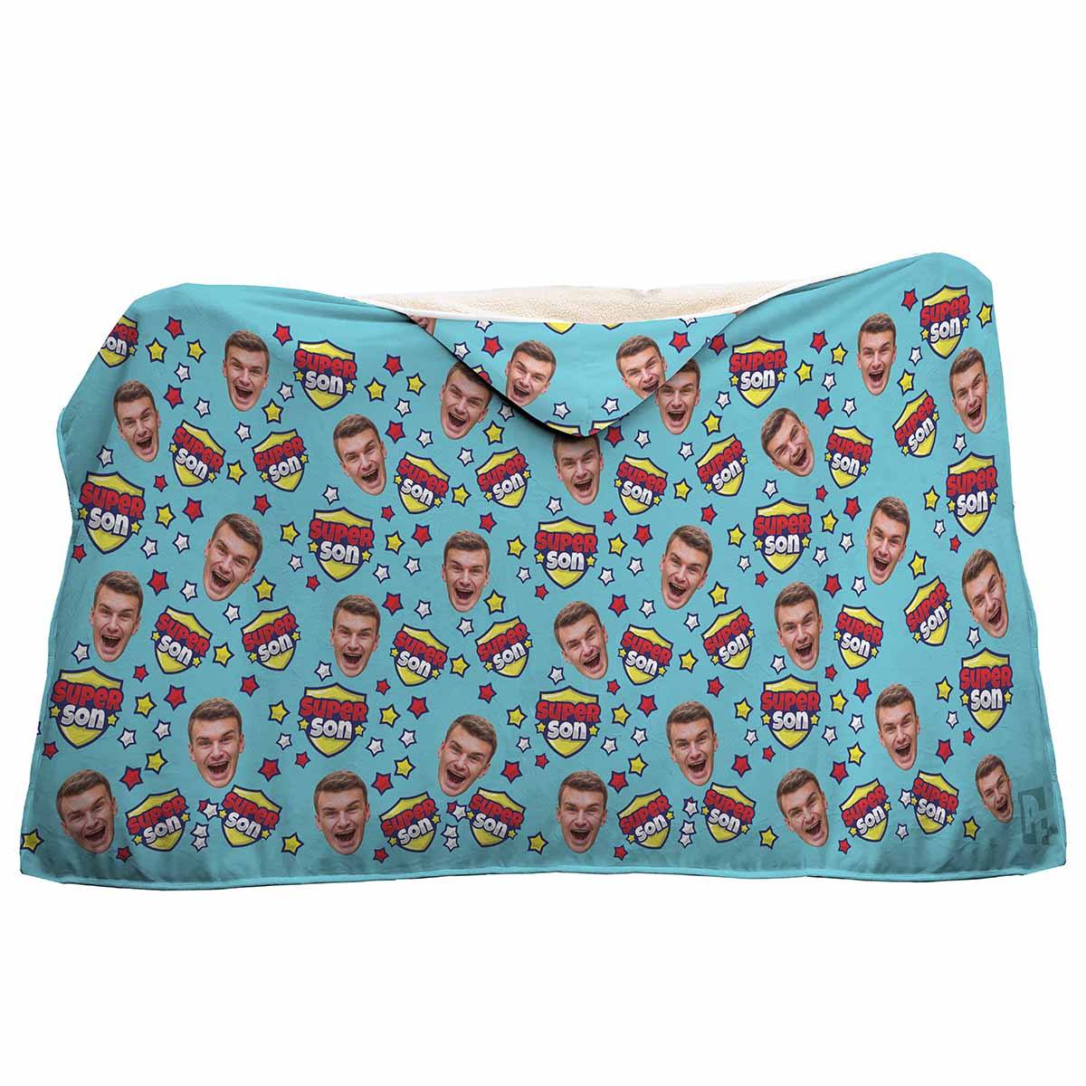 blue Super Son hooded blanket personalized with photo of face printed on it